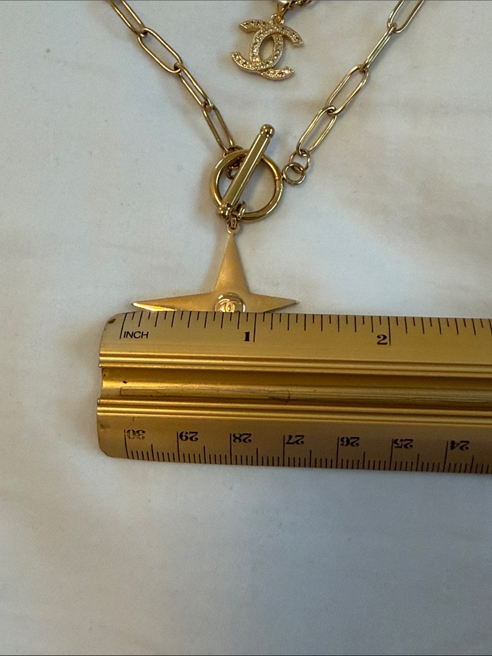 Gold-Tone Layered Star & Interlocking CC Pendant Necklace - - Picture 7 of 14